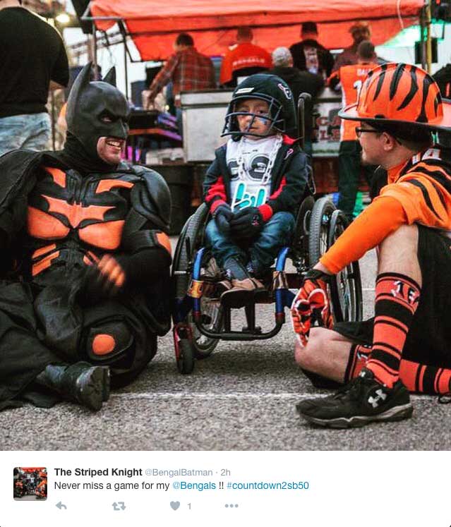 Twitter post of the Bengals Batman with two other fans